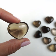 Load image into Gallery viewer, Clear and Smokey Quartz Heart
